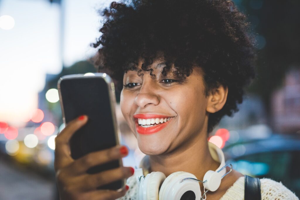 black woman using smartphone